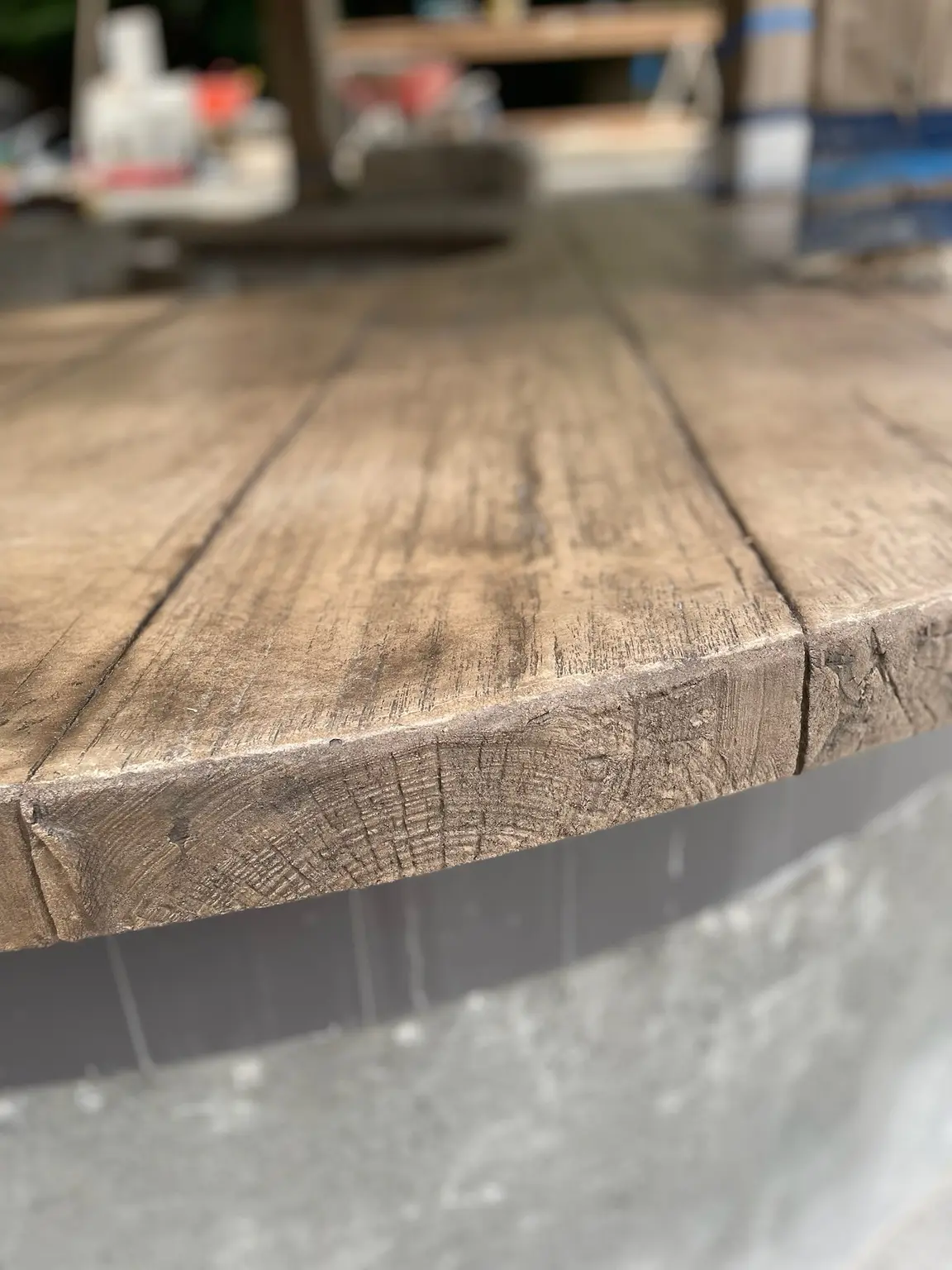 Handcrafted wood-grain detail on a concrete bar top